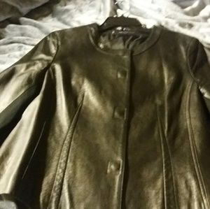 Leather classy jacket,stretch fabric under arms.